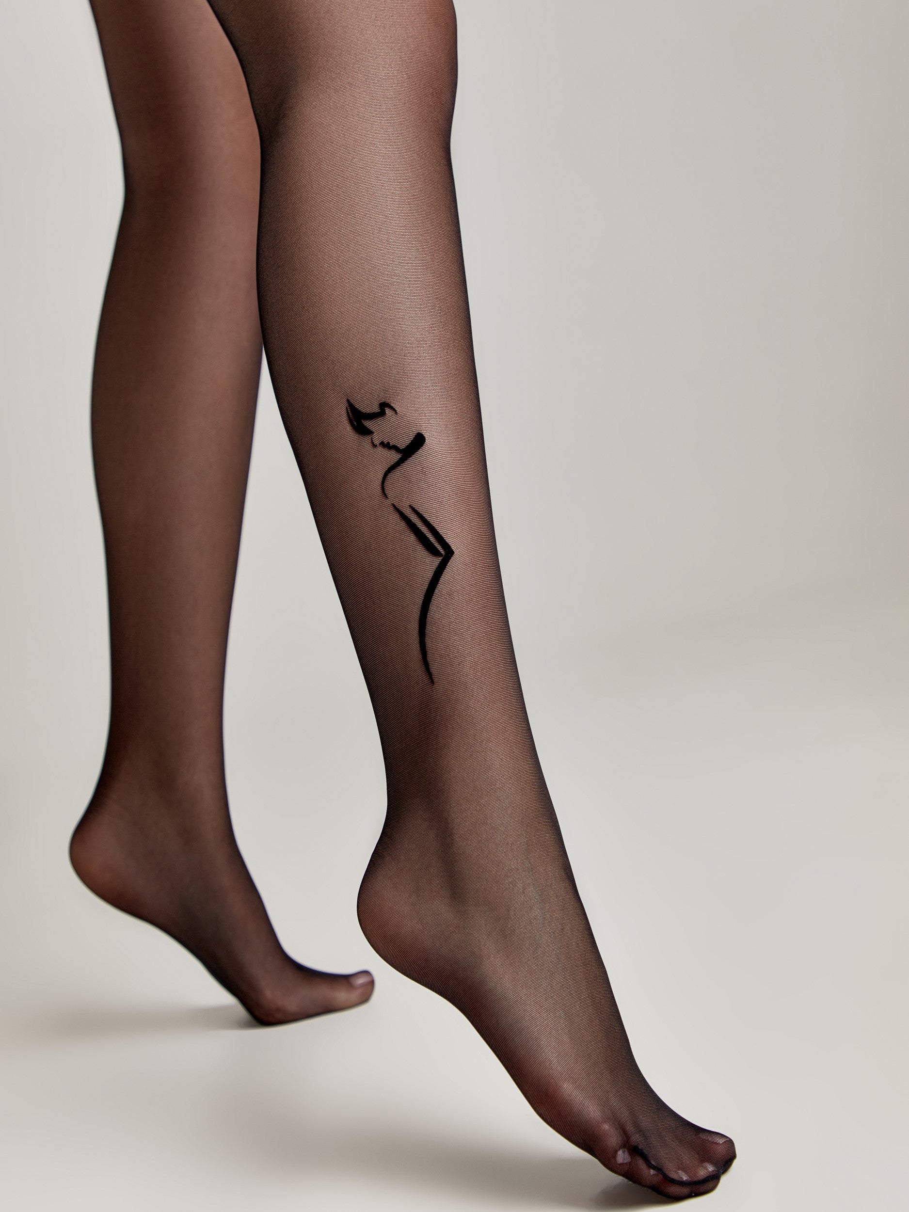 20 denske hlačne nogavice s tatujem FEMME
